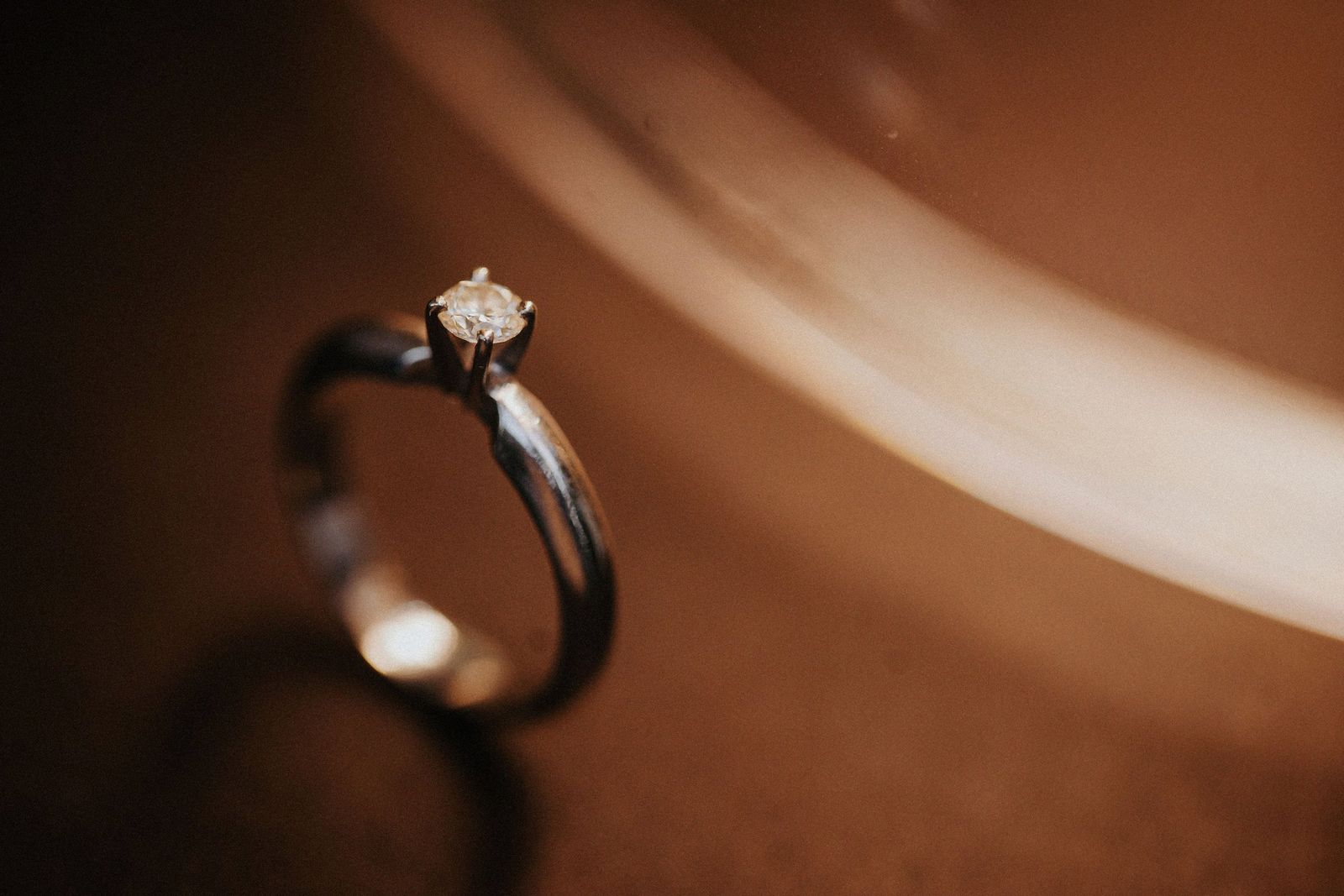 A worn ring on dark velvet