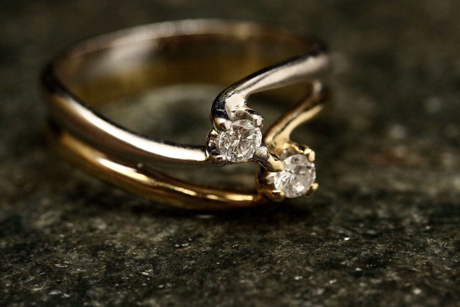 A two-stone crossover ring in yellow and white gold