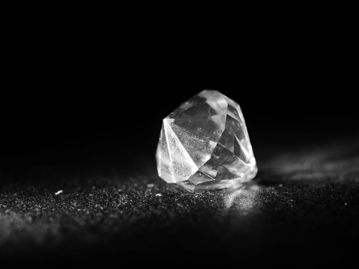 A pair of round diamond studs